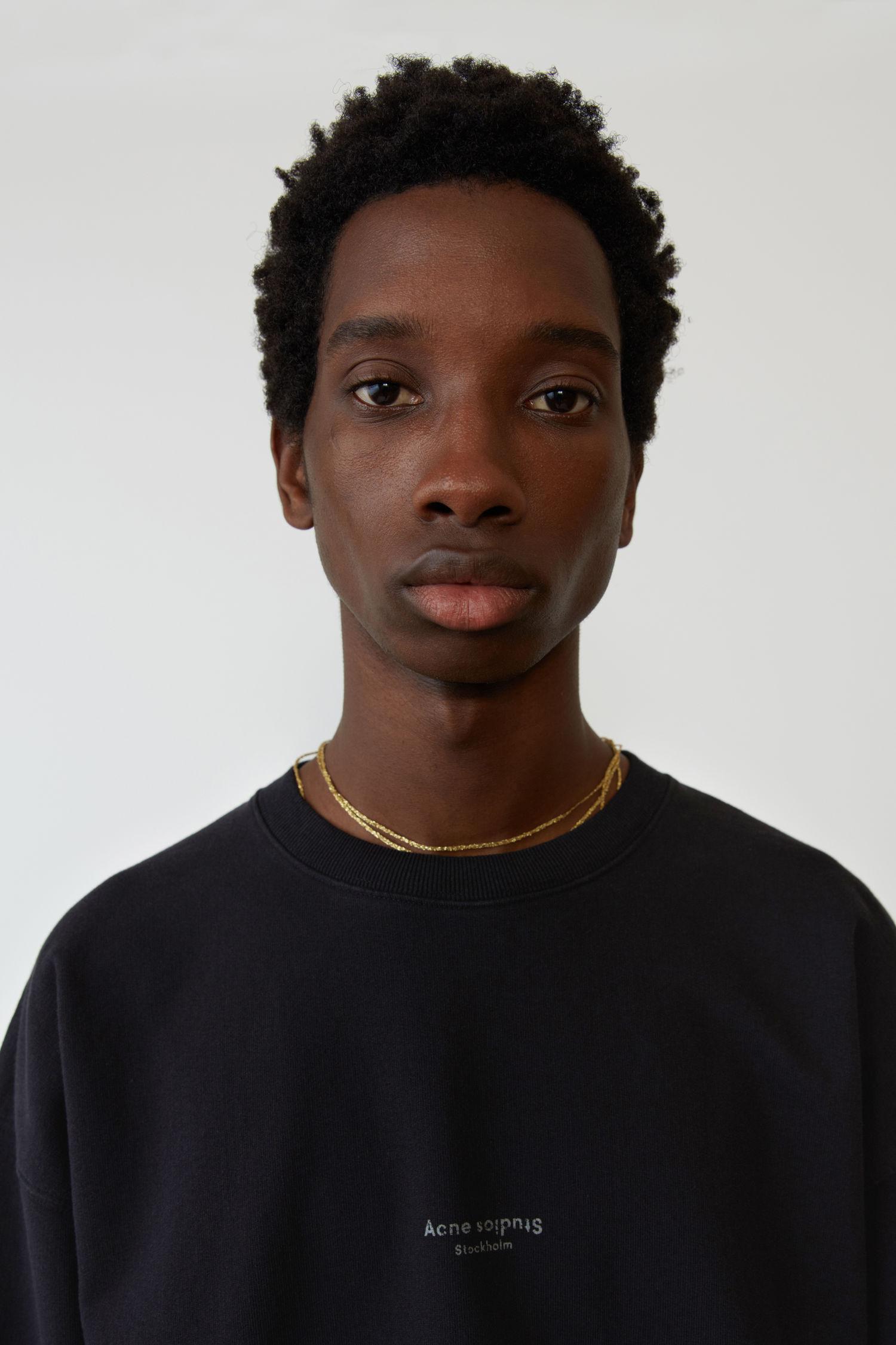 Acne garment dyed sweatshirt black sale