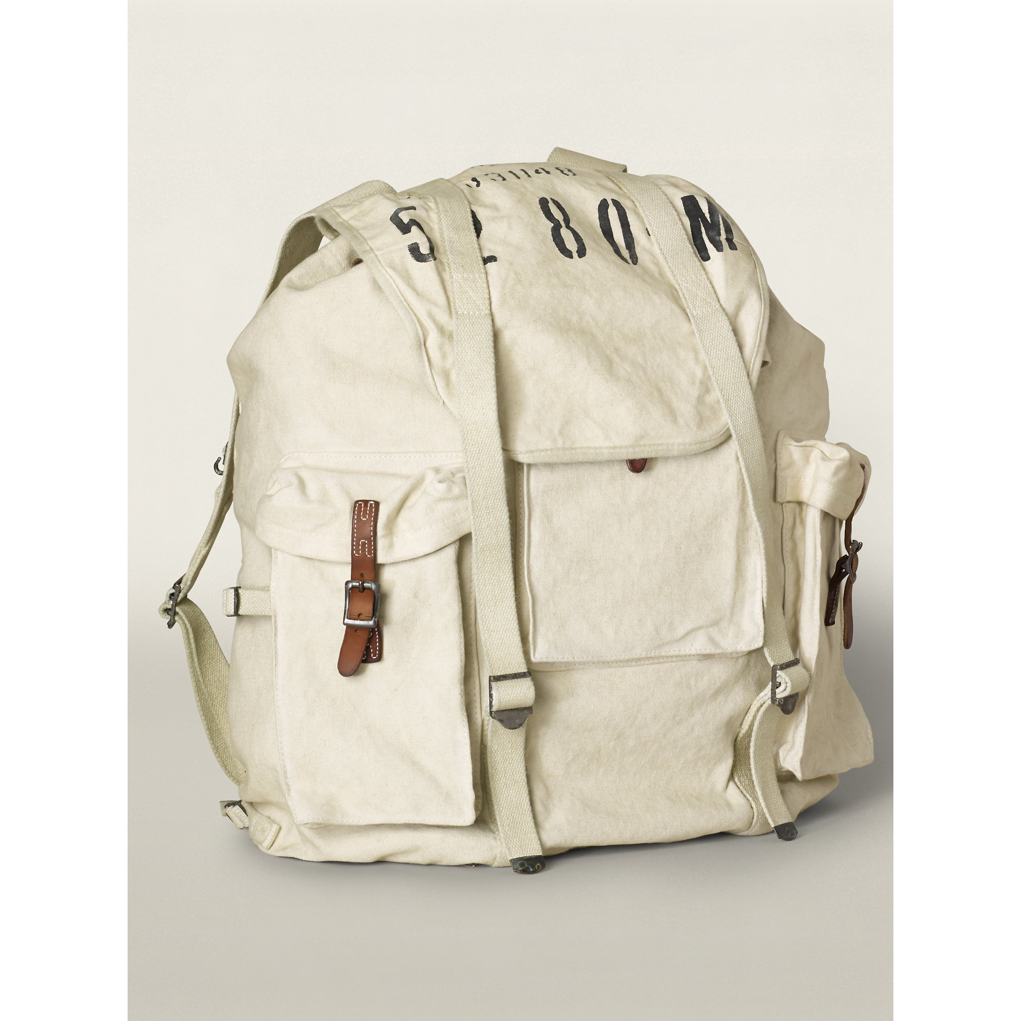 white canvas backpack