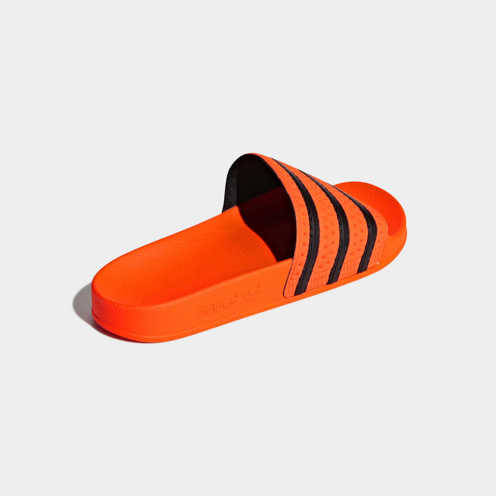 adidas Adilette Slides in Orange | Lyst UK