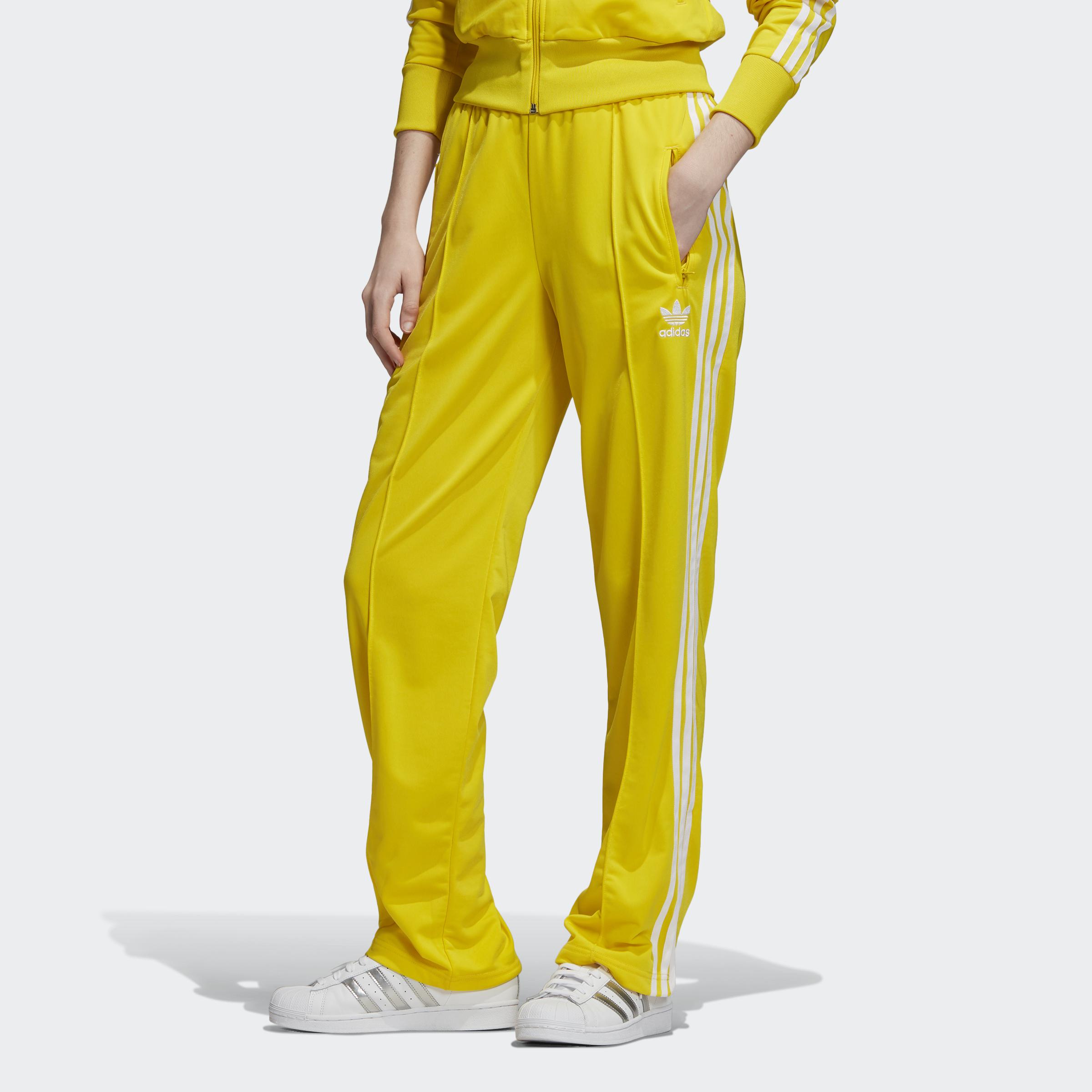 Pantalón Firebird adidas de color Amarillo - Lyst