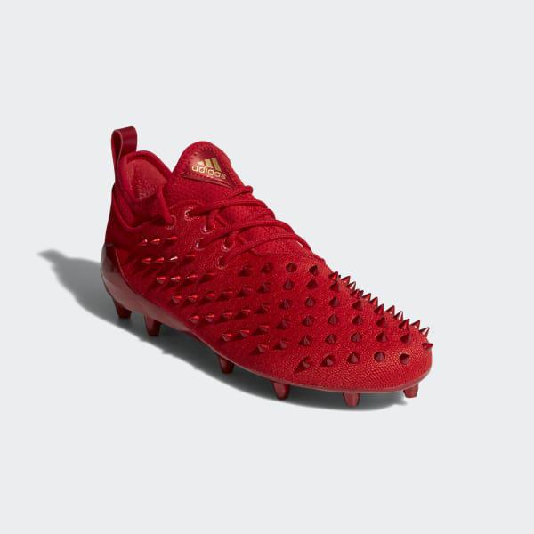 red spike adidas cleats