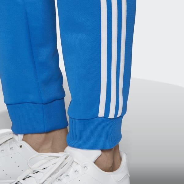 adidas sst track pants blue