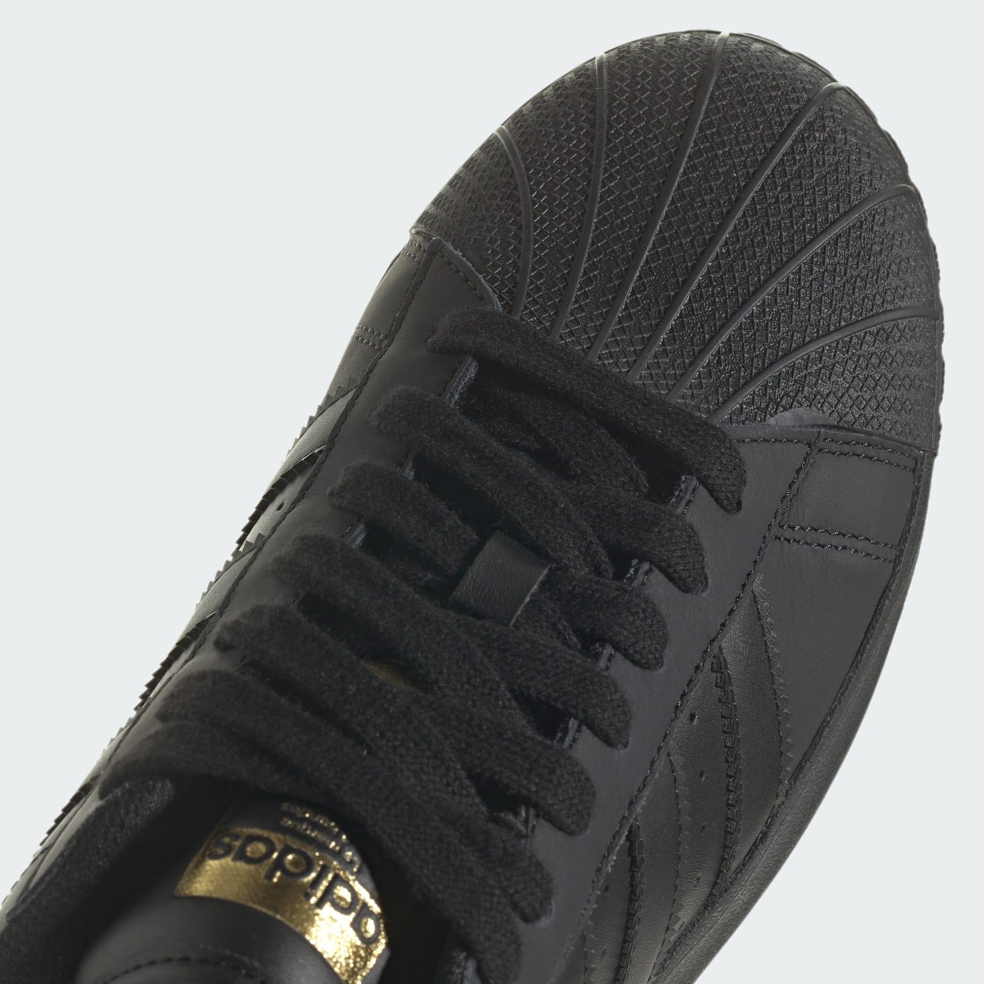 superstar shoes black red yellow green