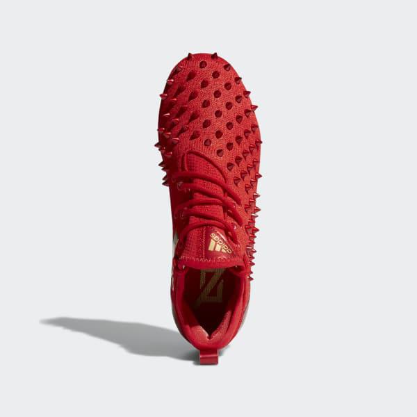 red spike adidas cleats