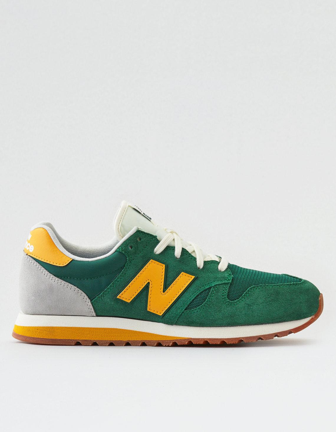 new balance yellow 520 suede trainers