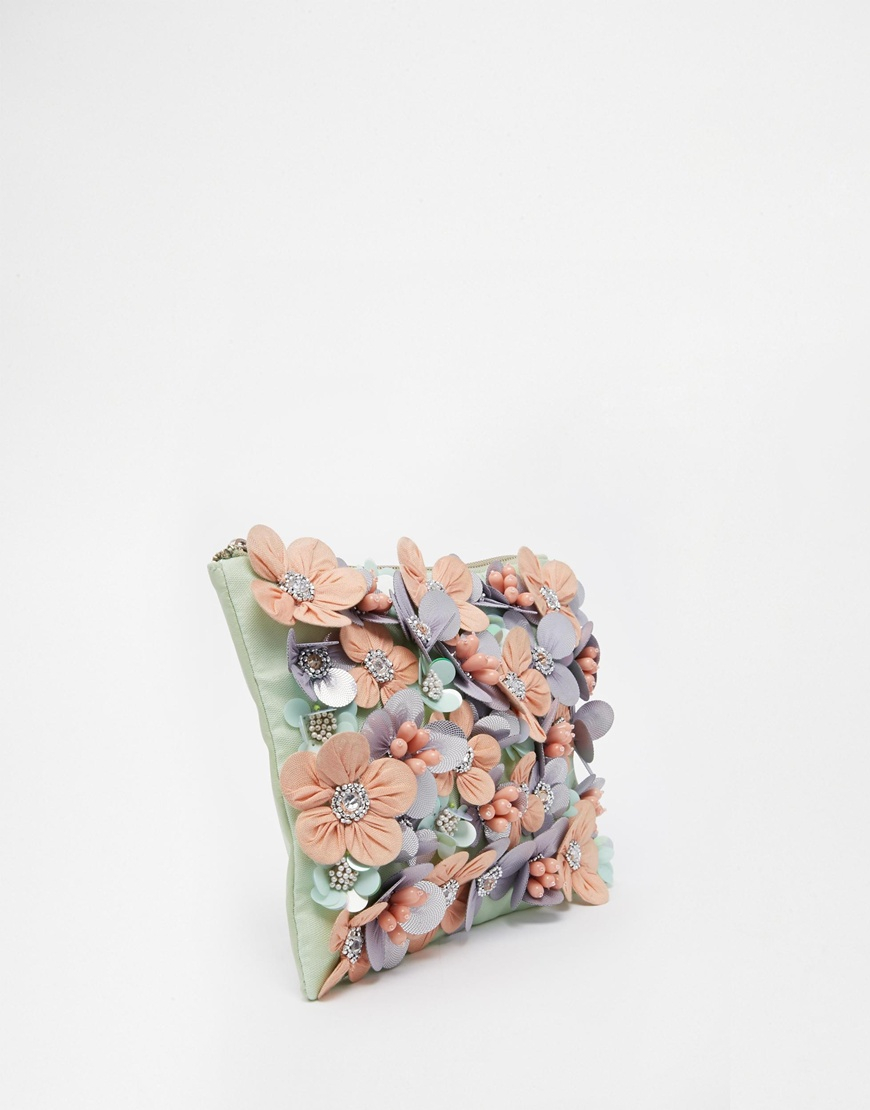 flower embellished clutch bag