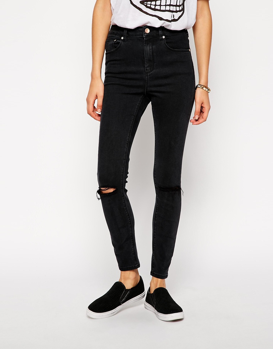 black jeans with ripped ankles