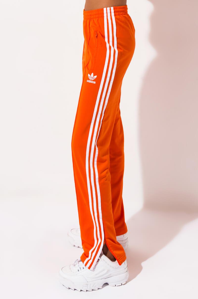 orange adidas sweatpants 