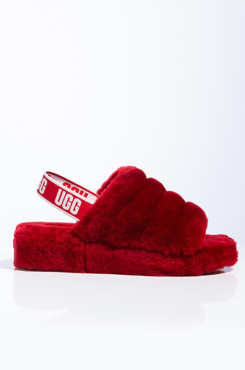 red fluffy ugg slides