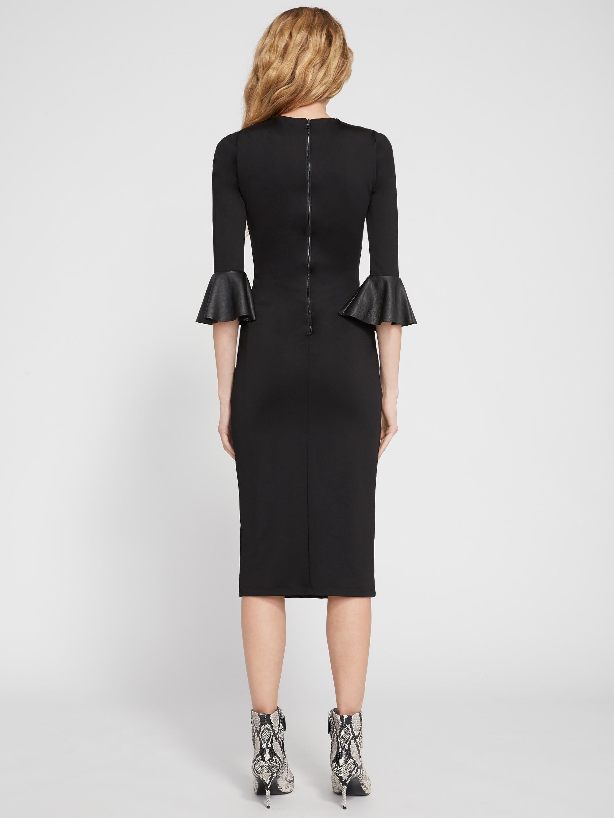 black trumpet sleeve dress