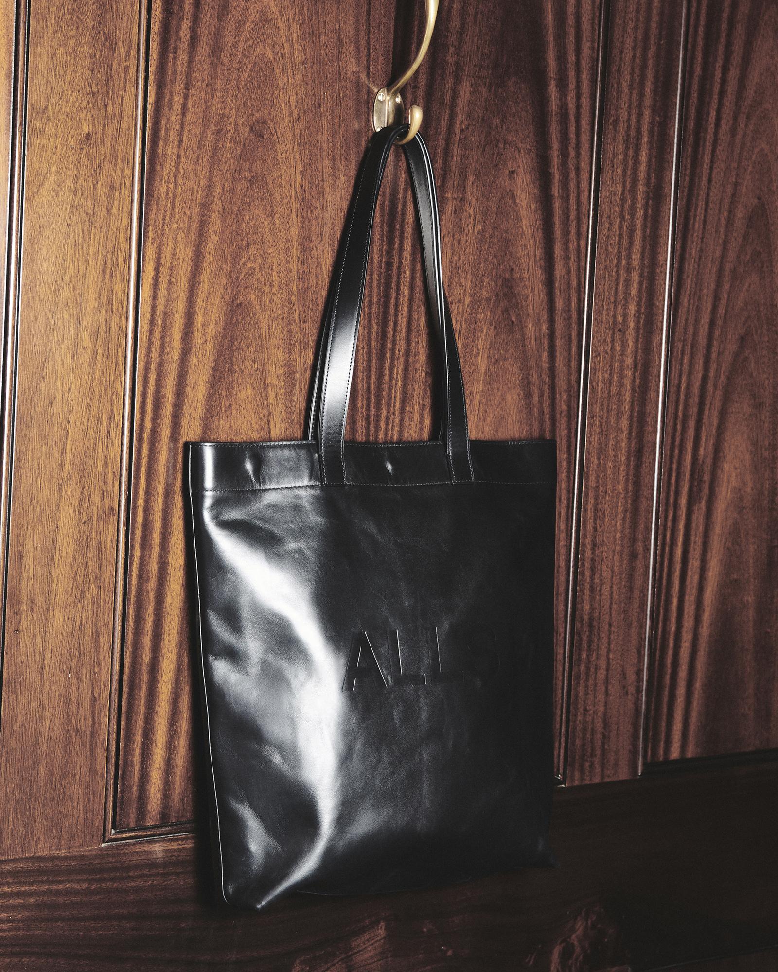 AllSaints Yuto Embossed Logo Leather Tote Bag in Black for