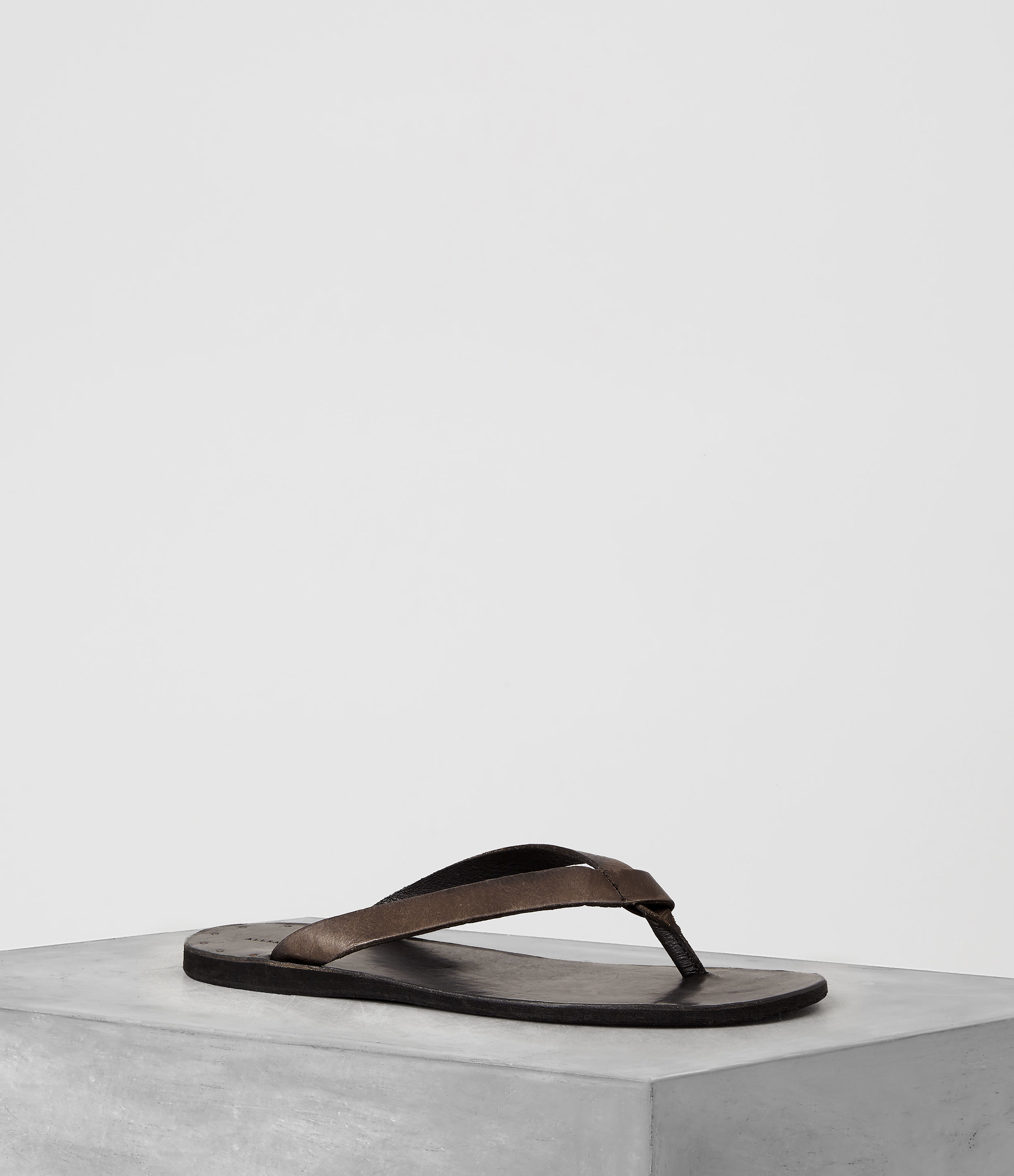 reef black leather flip flops