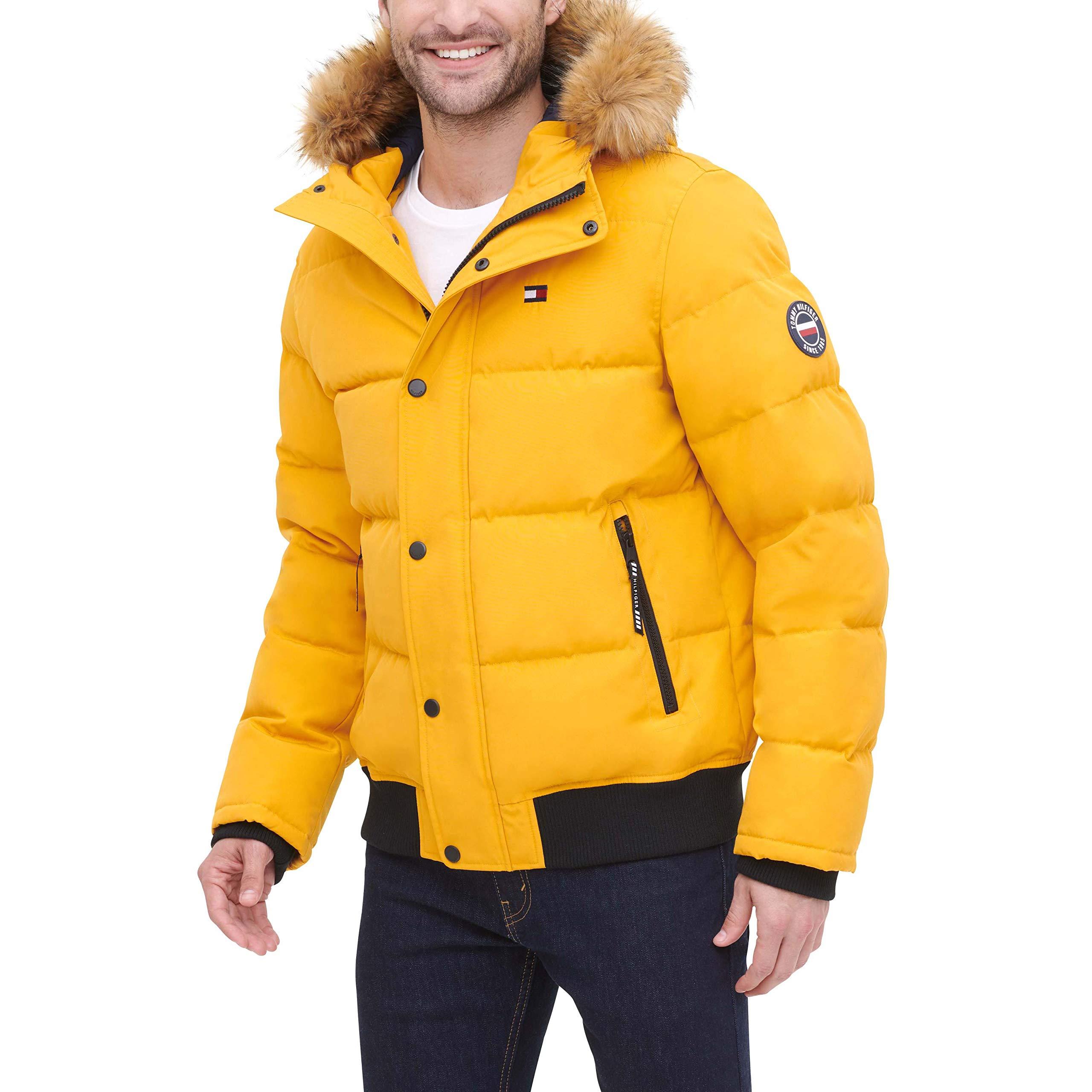 yellow padded coat with fur hood