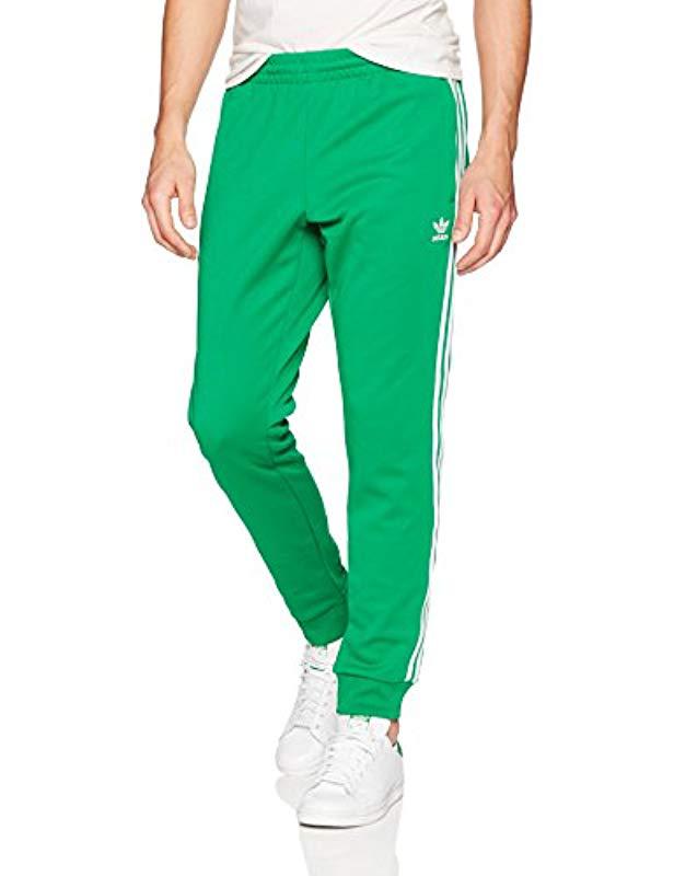 adidas superstar track pants green