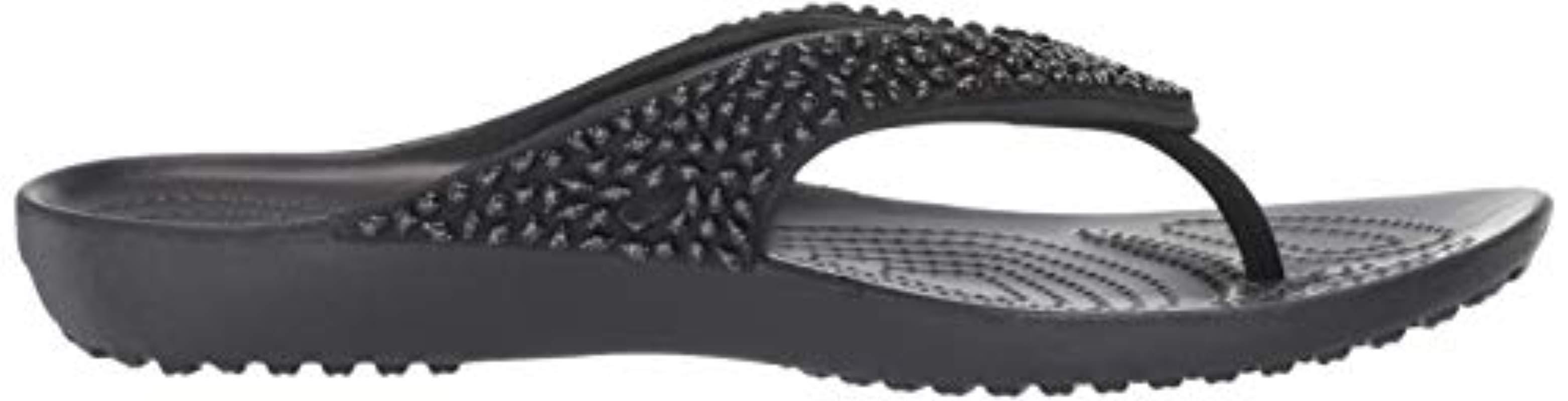 black embellished flip flops