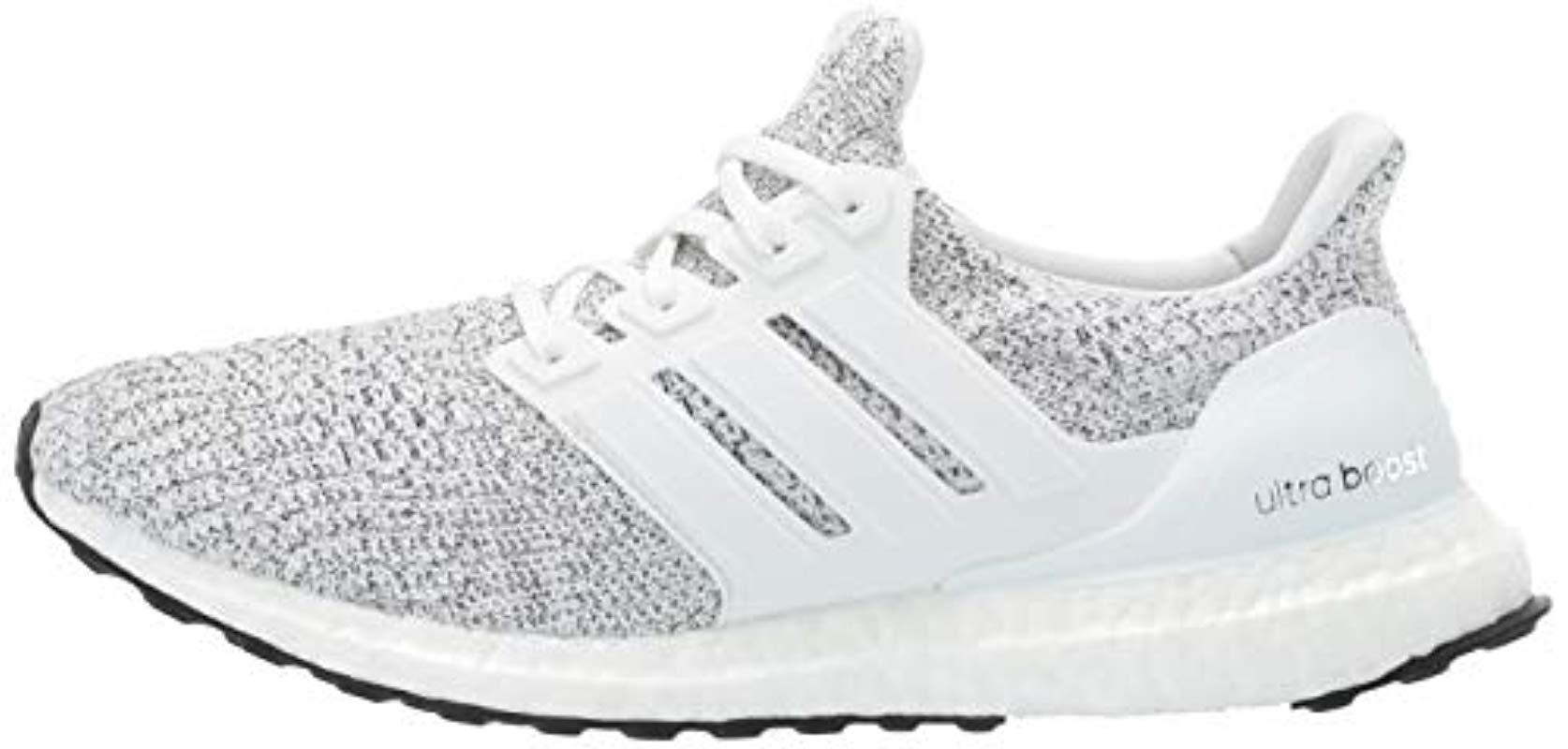 white and neon ultra boost