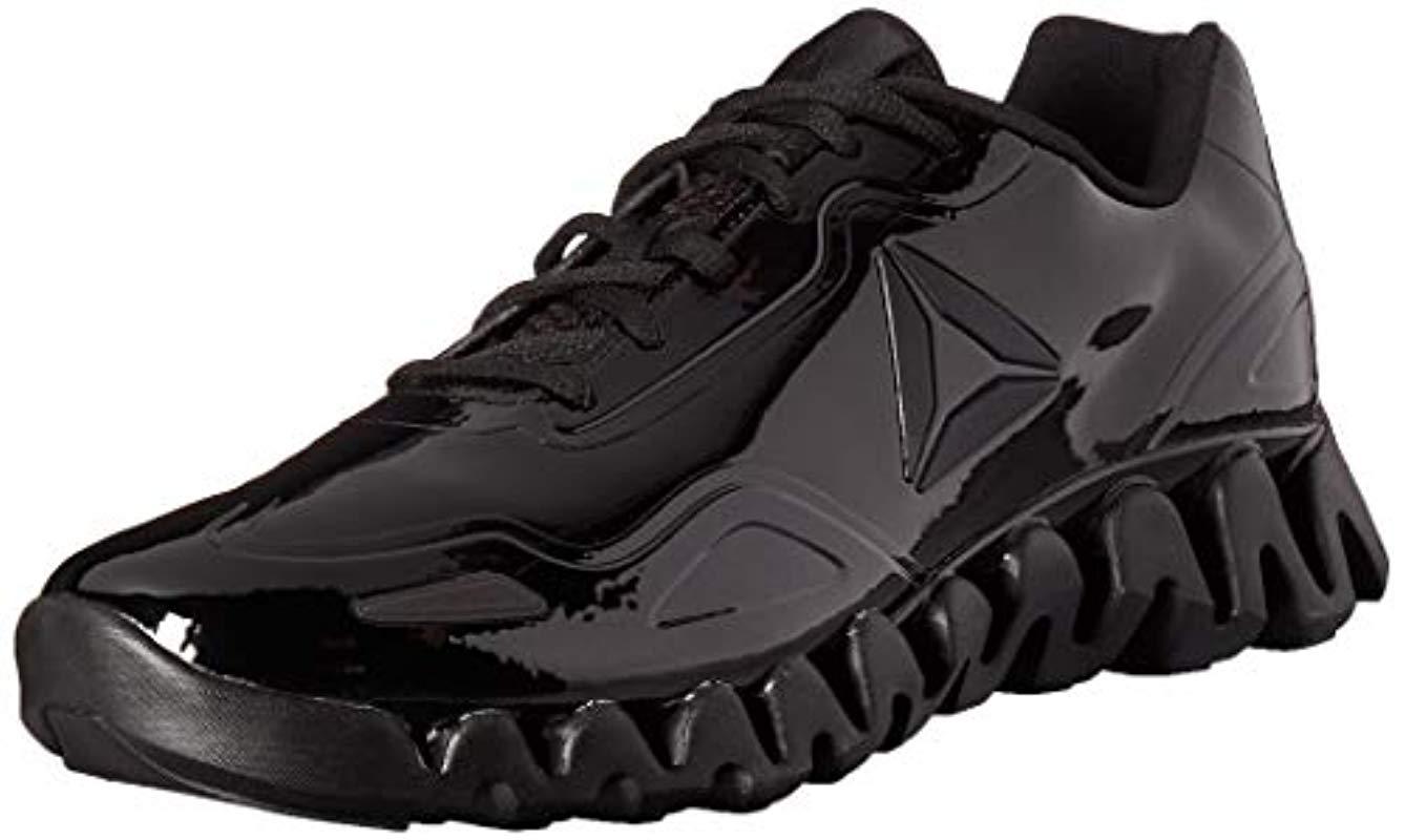 Reebok S Zig Pulse Se in Black/Black/Patent (Black) for Men Save 21