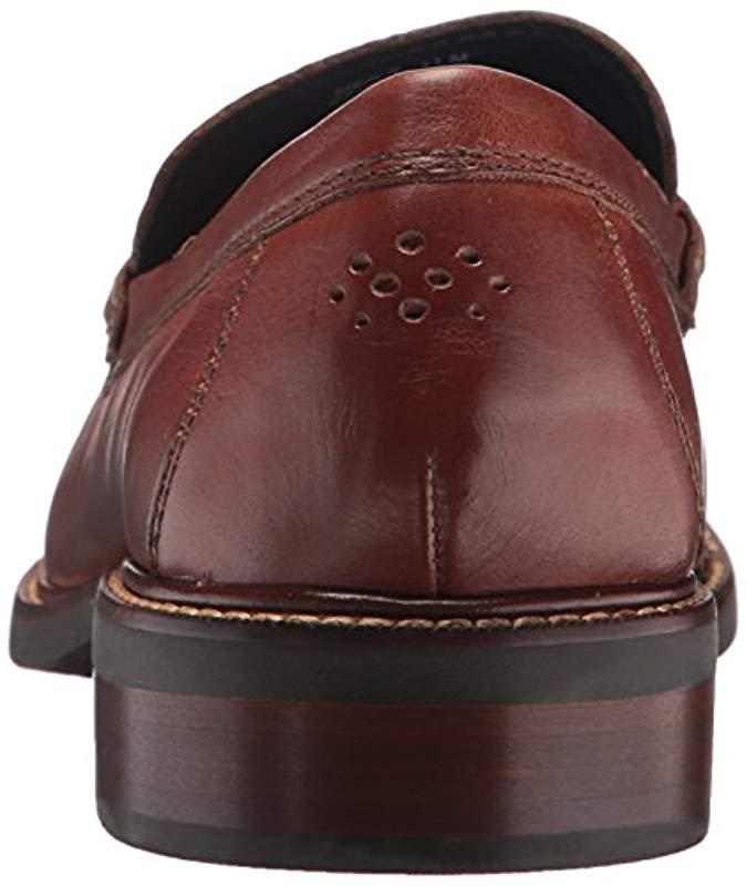 cole haan pinch tassel saddle tan