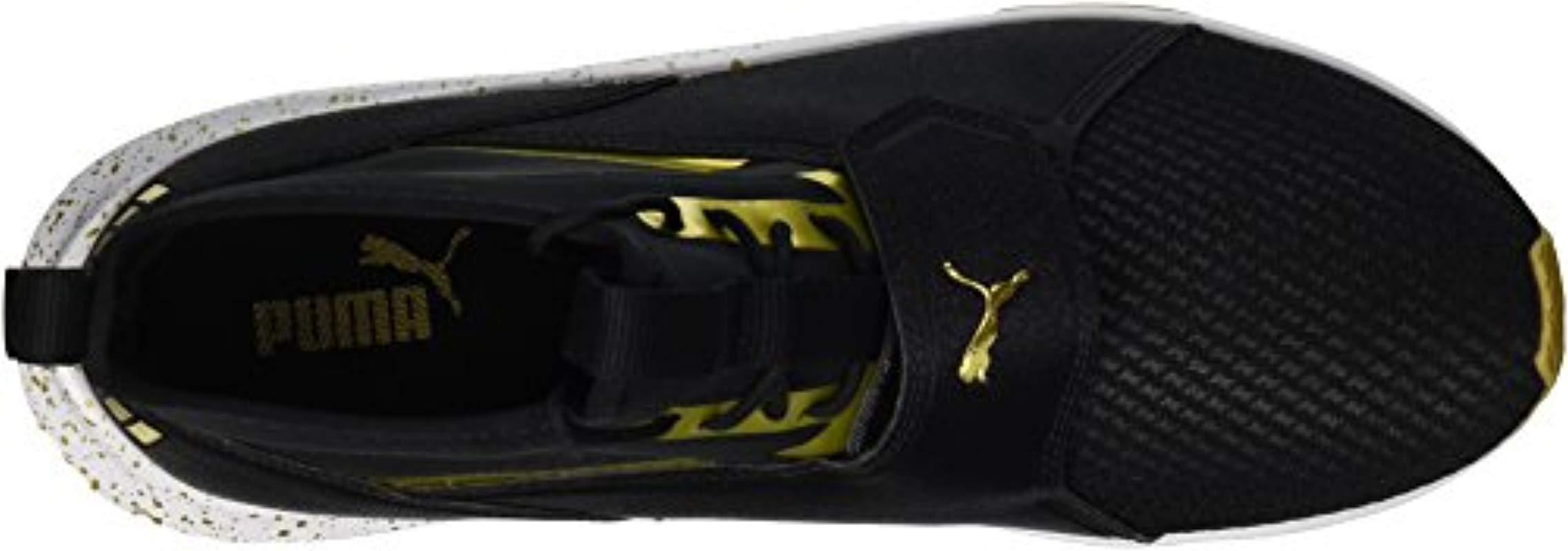 puma phenom black and gold