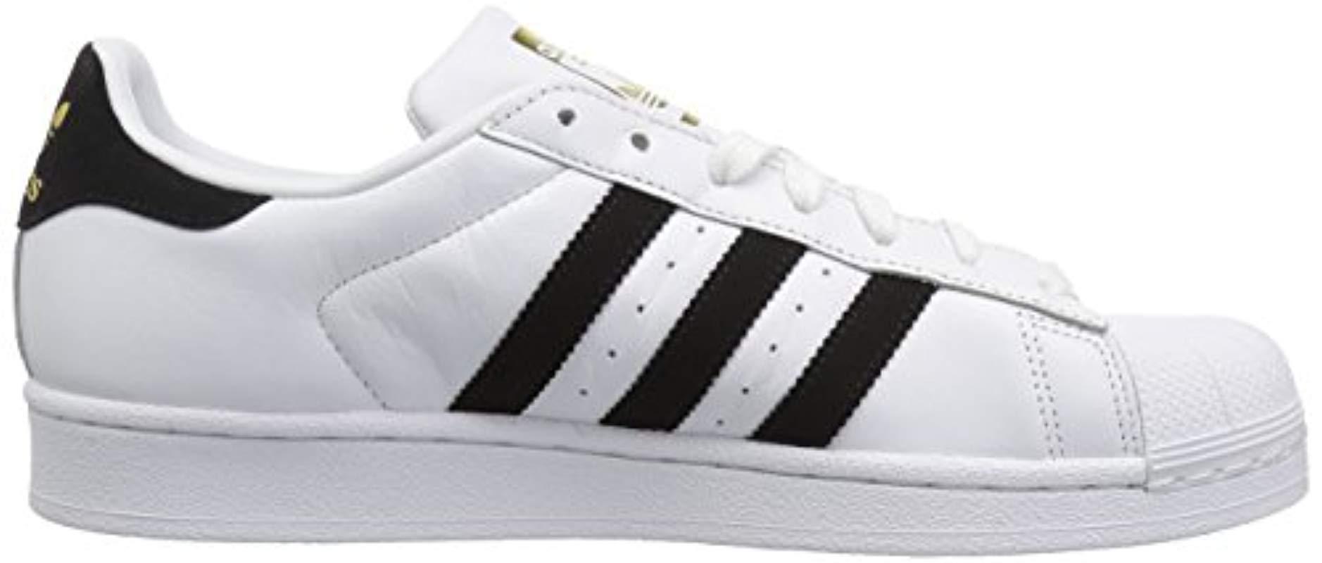 black white gold adidas shoes