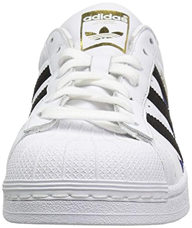 black white and gold superstars