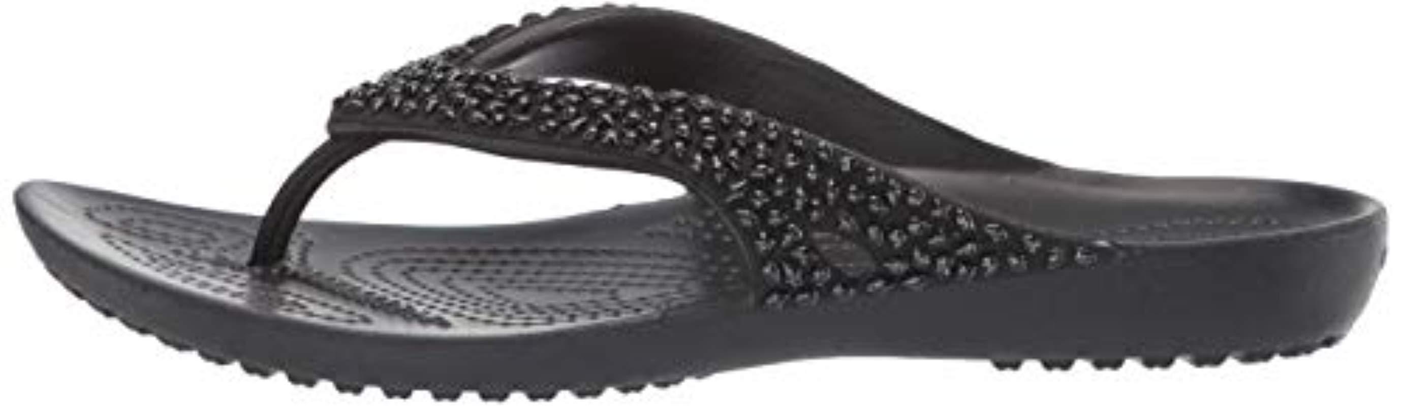 black embellished flip flops