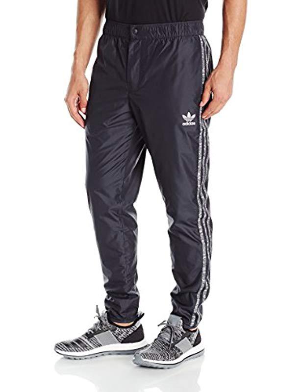 Adidas essentials wind pants Clearance