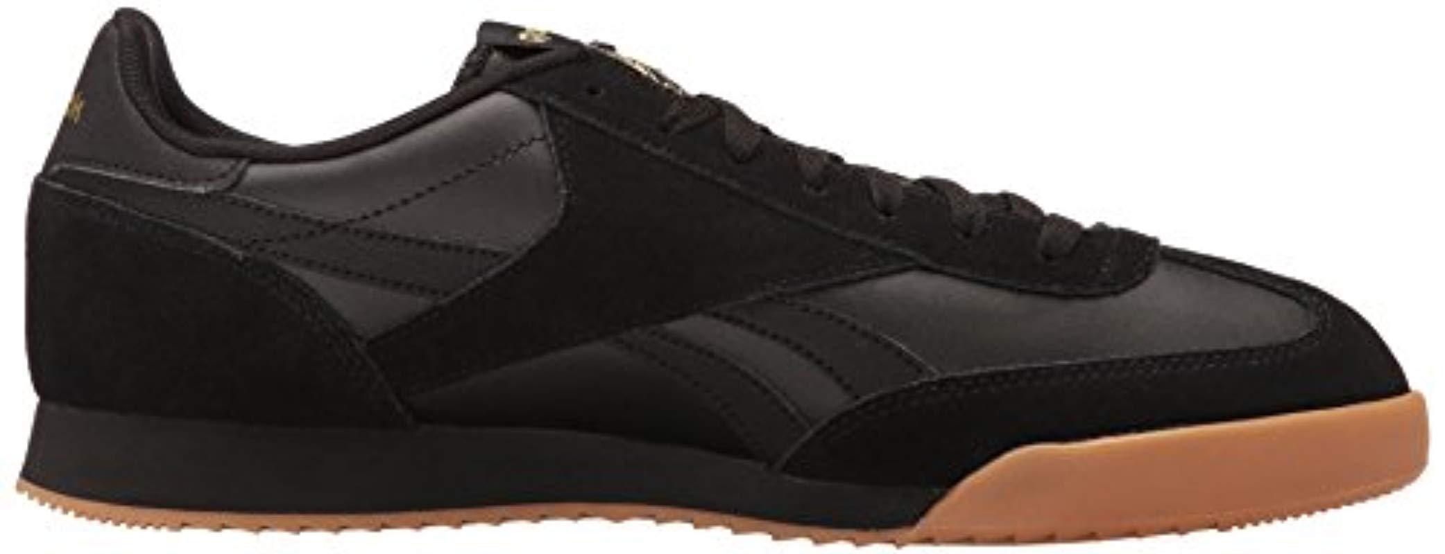 reebok classic black and gold