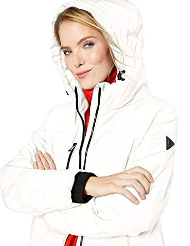 guess women's knee length heavy quilted puffer coat with hood