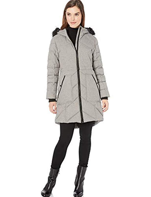 GUESS Womens Knee Length Heavy Puffer Coat with Faux Fur Trimmed Hood