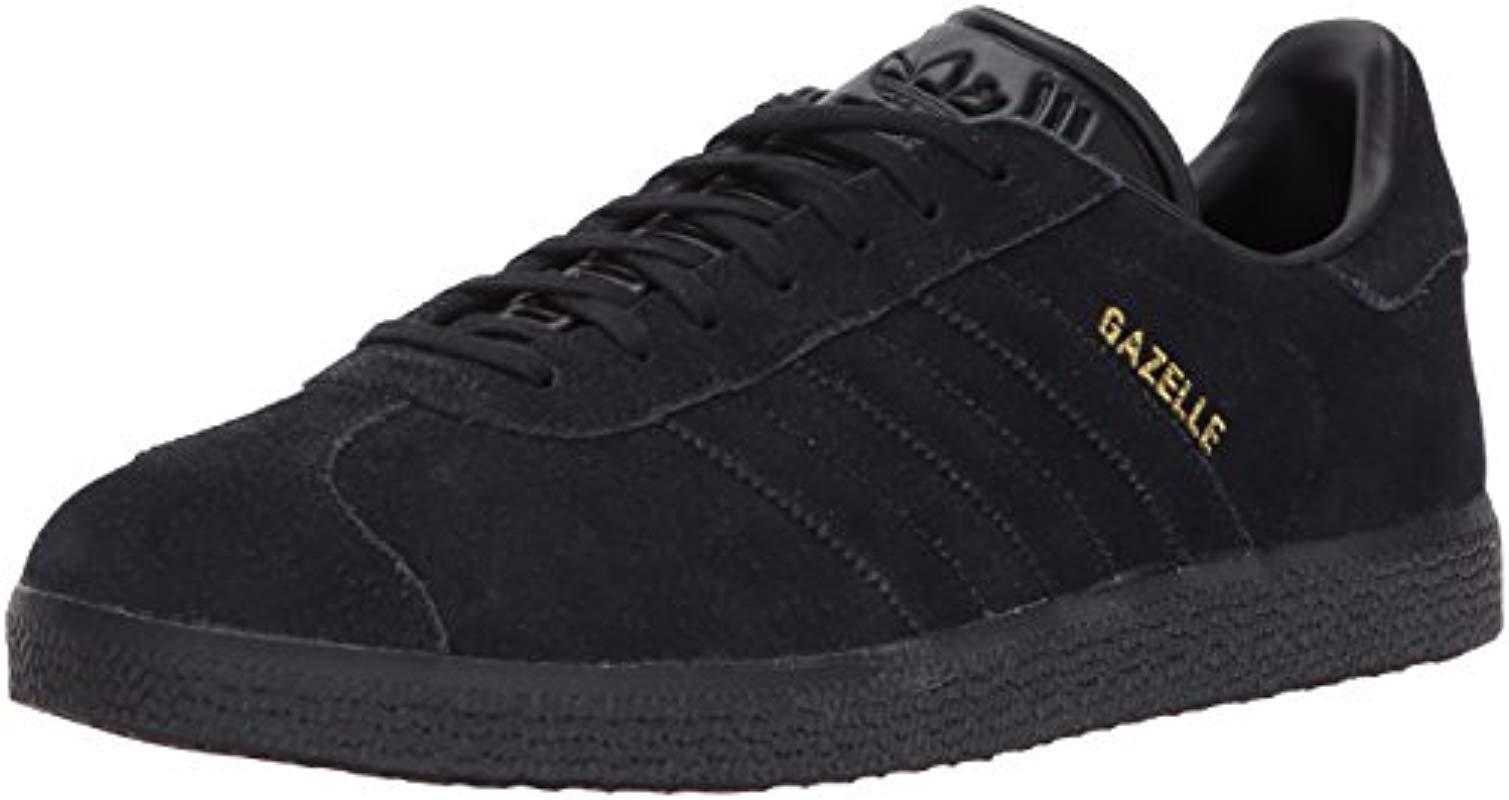adidas gazelle black and gold suede