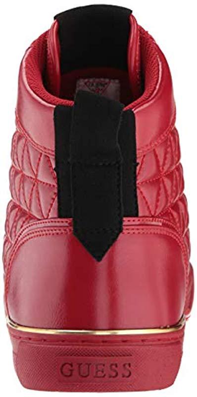guess red trainers
