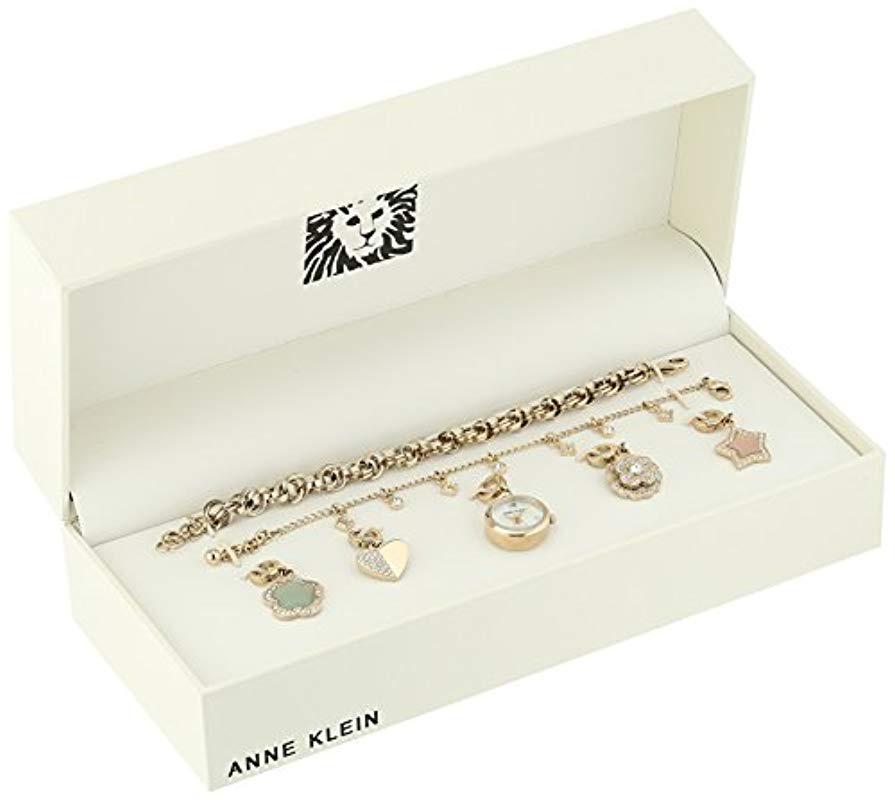 Anne Klein Ak 3044chst Swarovski Crystal Accented Gold Tone Charm Watch And Bracelet Set In Metallic Lyst