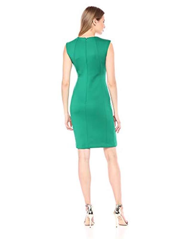 Calvin Klein Sleeveless Sheath With Gold Ring Cut Out Dress in Green - Lyst