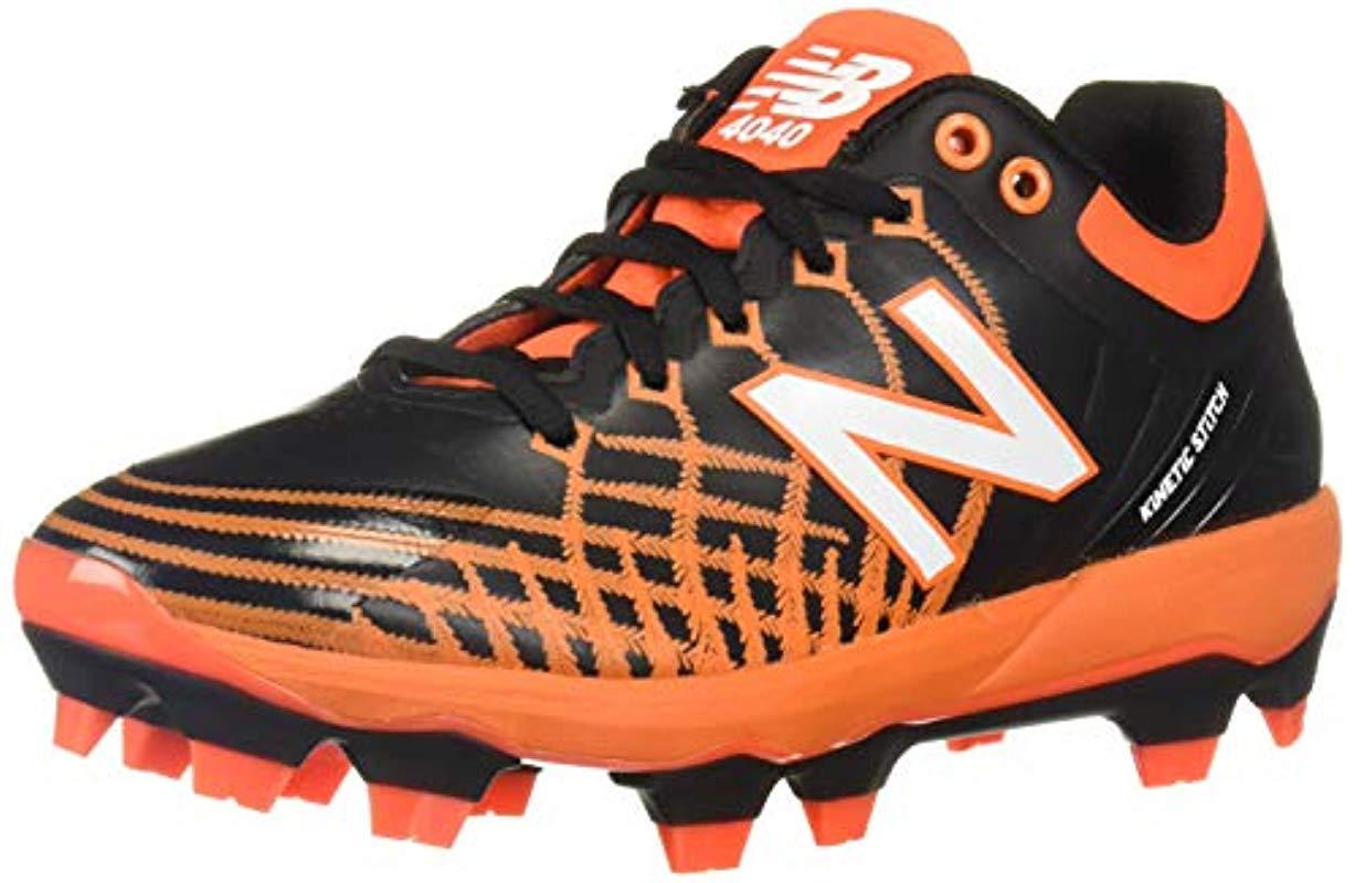 black and orange new balance cleats