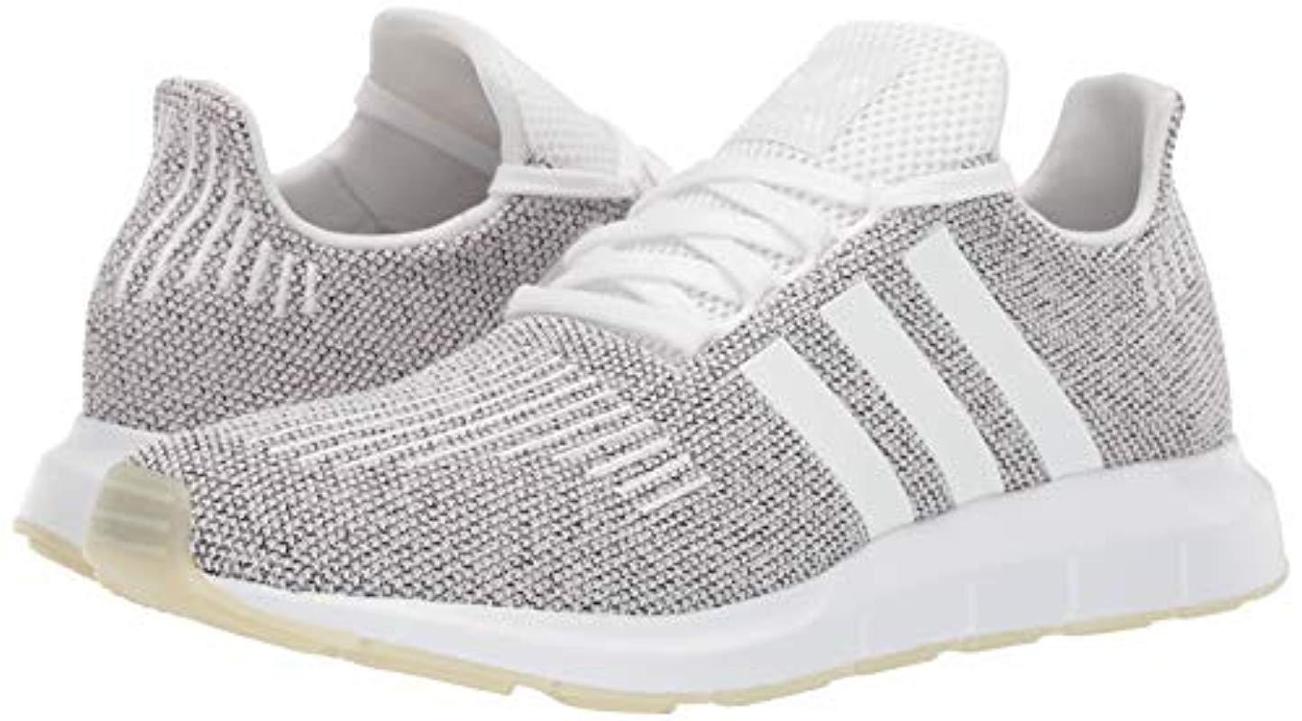 swift run sneaker white white core black