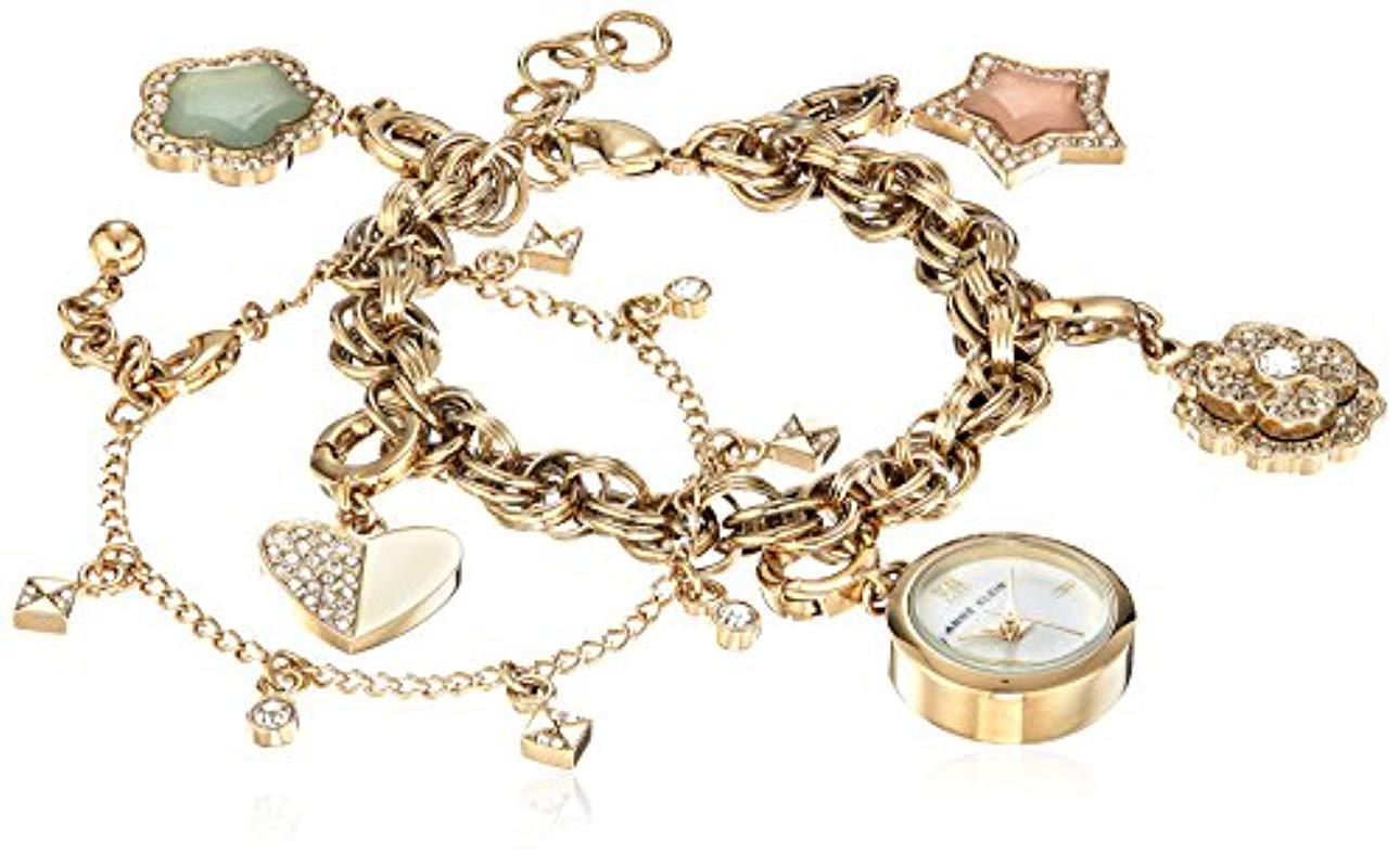 Anne Klein Ak 3044chst Swarovski Crystal Accented Gold Tone Charm Watch And Bracelet Set In Metallic Lyst