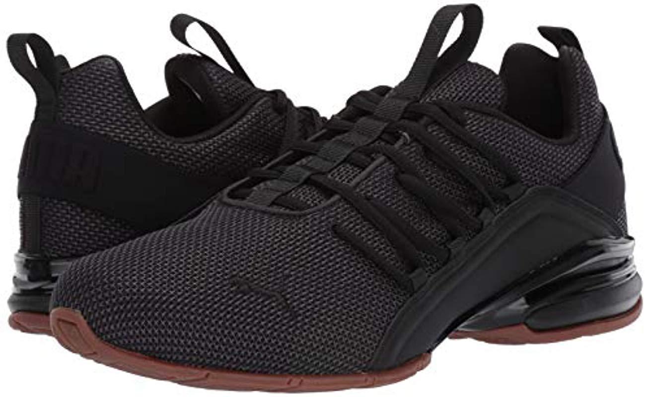 puma axelion black and white