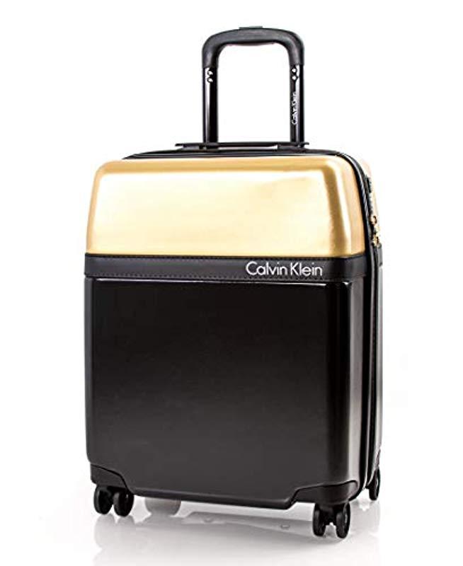 black and gold carry on luggage