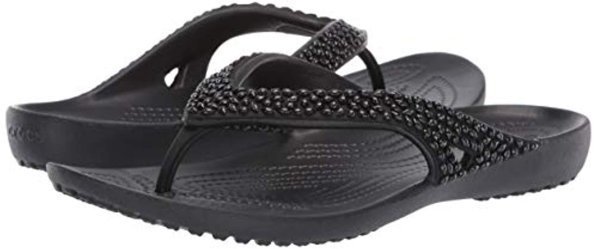 black embellished flip flops