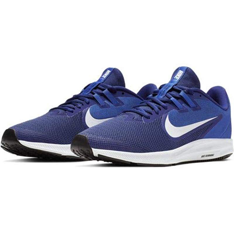 royal blue and white tennis shoes