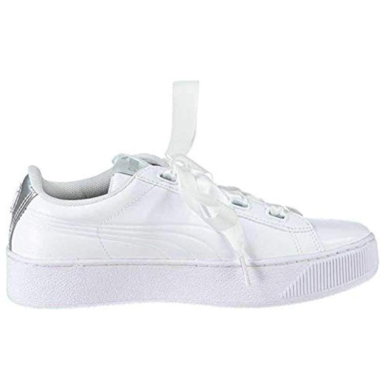 puma white ribbon shoes
