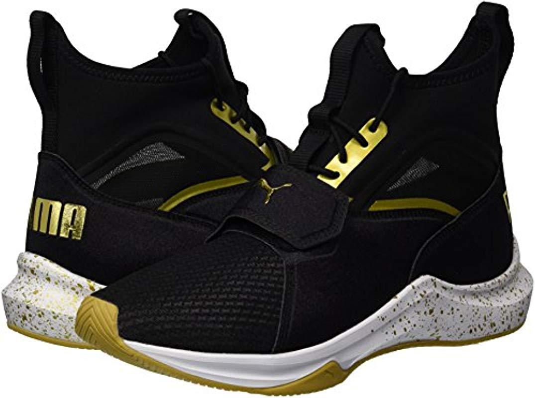 puma phenom black and gold