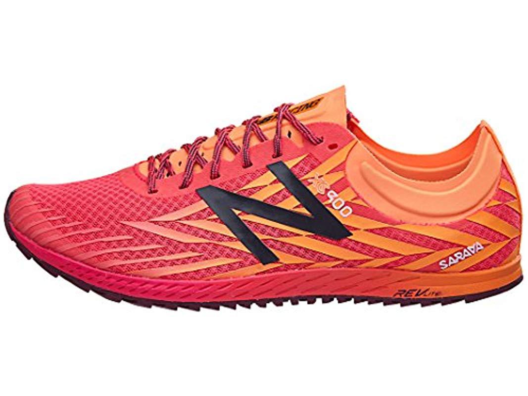track shoes with removable spikes