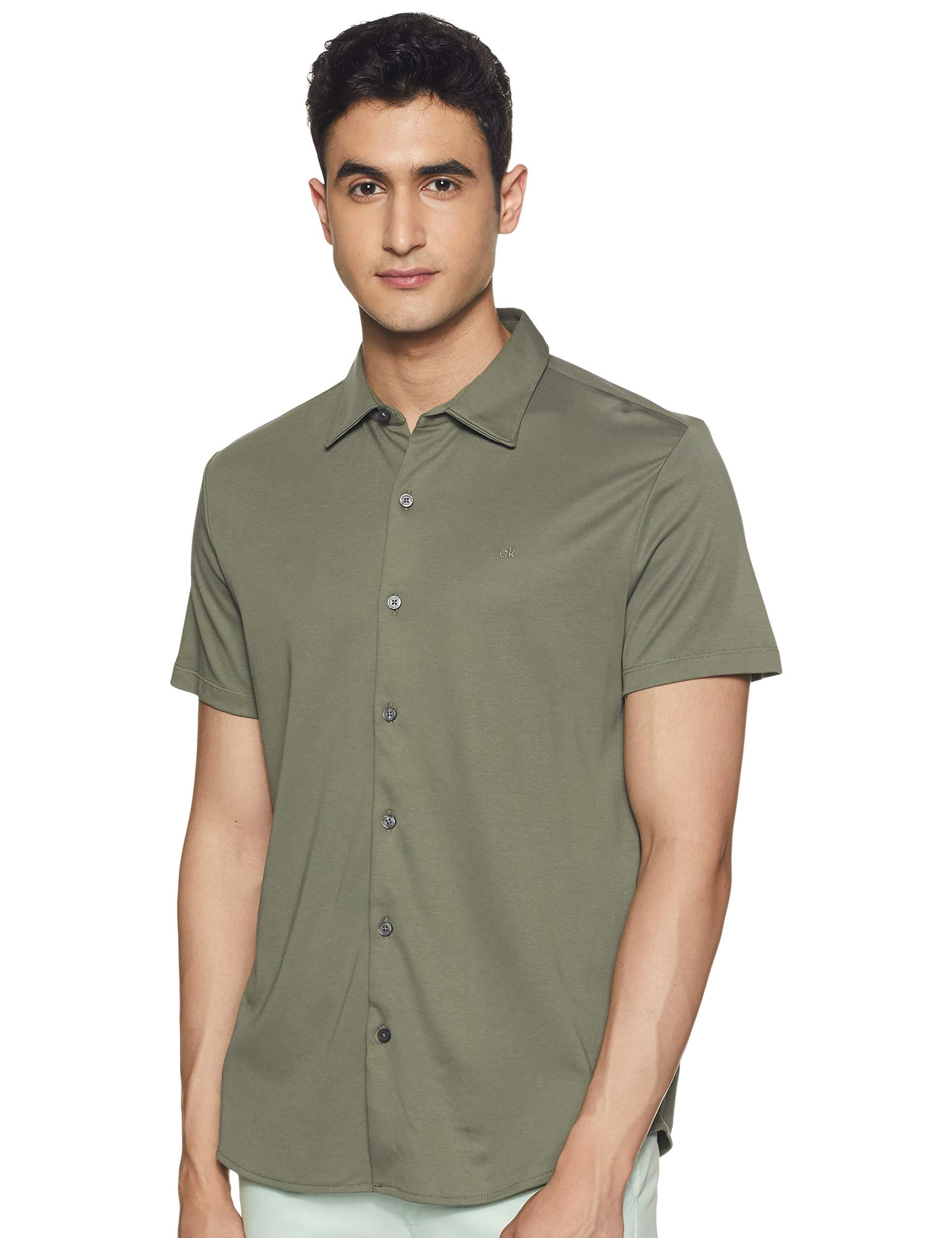 Calvin Klein Short Sleeve Liquid Touch Polo Button Down Shirt for Men | Lyst