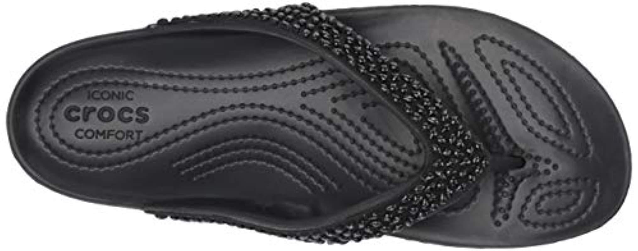 black embellished flip flops