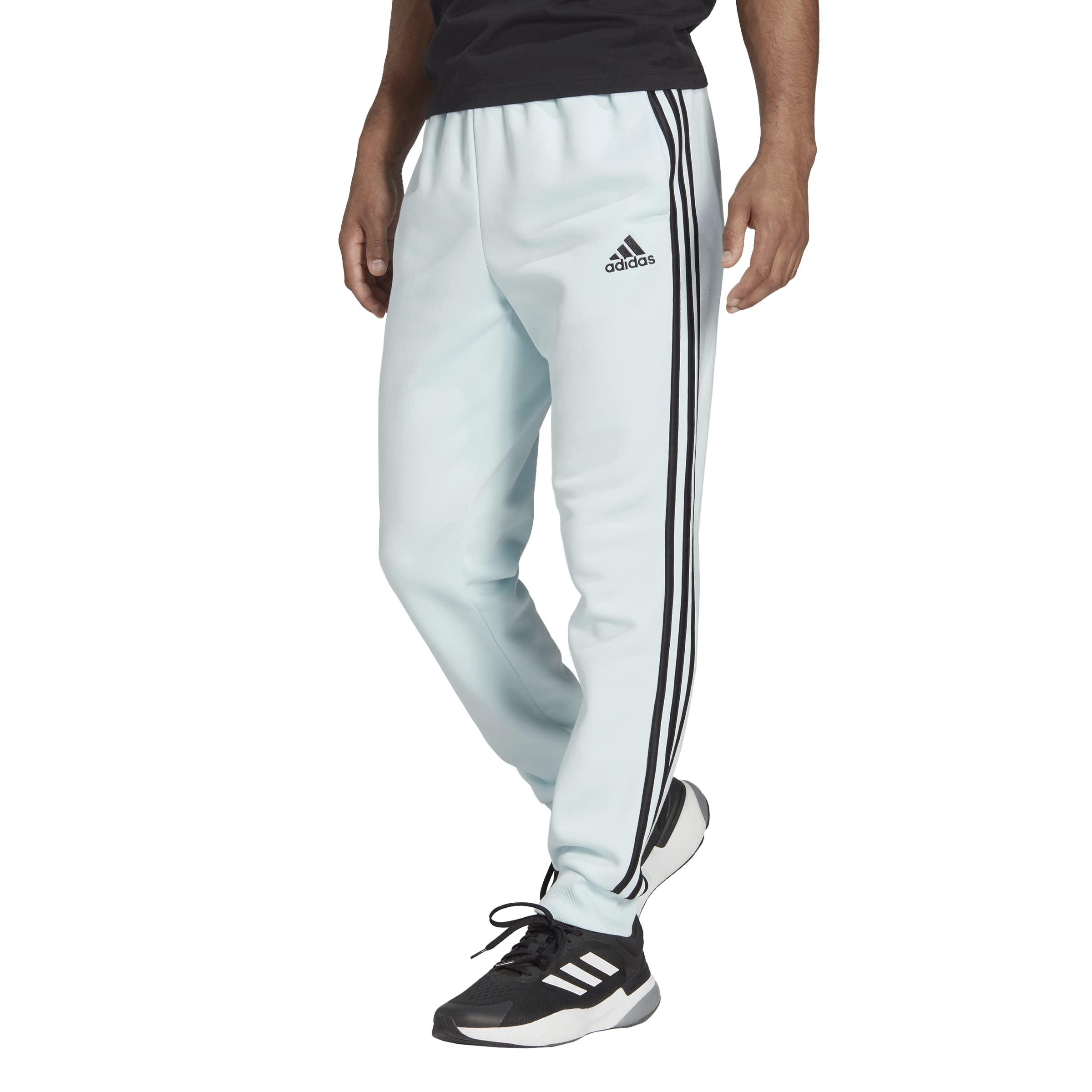 adidas Essentials Fleece Tapered Cuff 3-stripes Pants in Blue for Men | Lyst