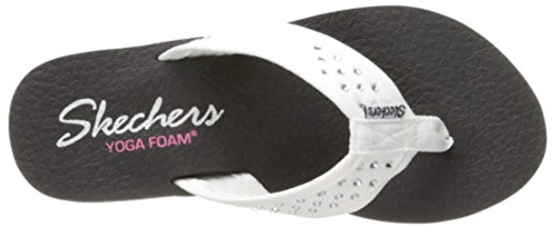 skechers yoga foam flip flops white