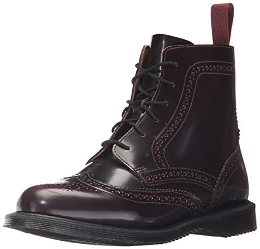 Dr. Martens Delphine 8 eye Brogue Boot in Black Lyst