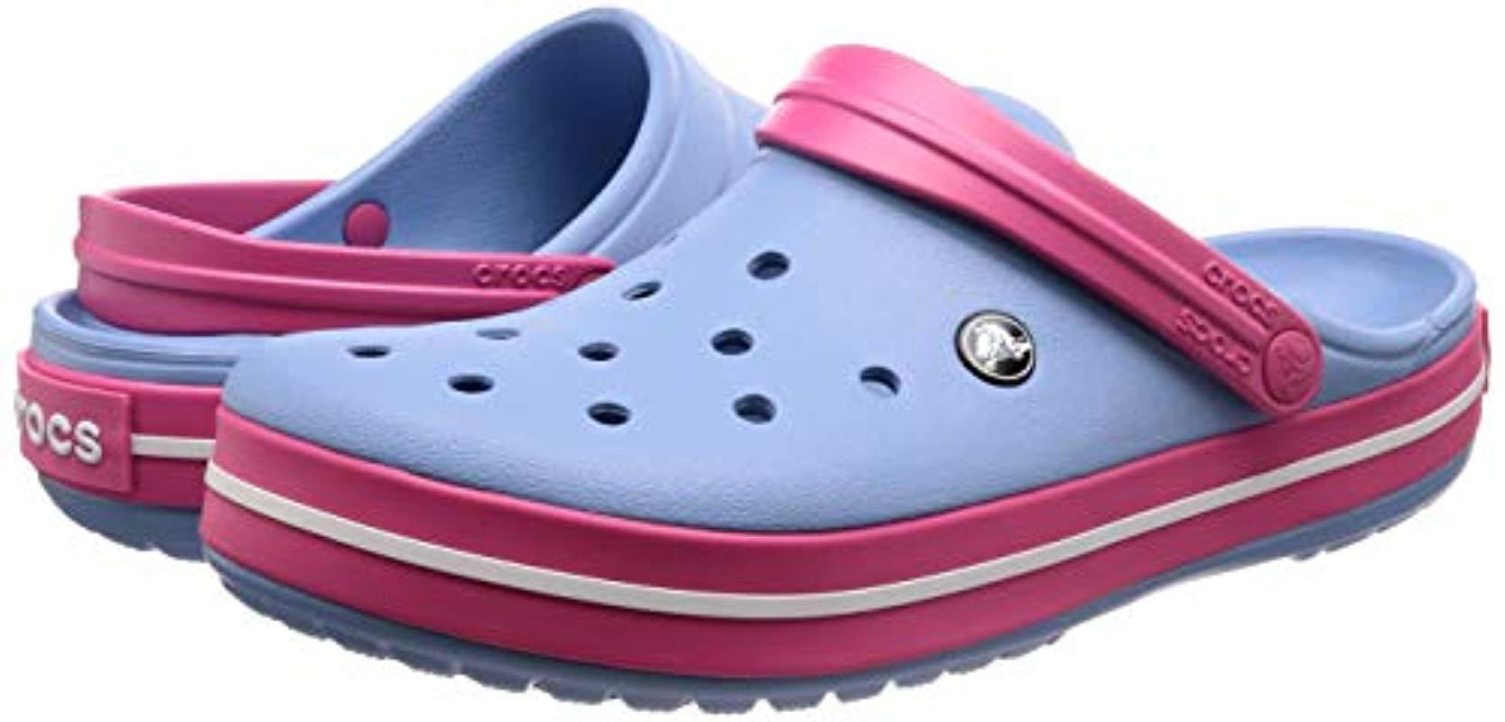 pink and blue crocs